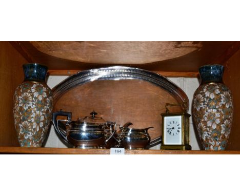 A pair of Royal Doulton Slater ware vases, a plated tea service and a carriage timepiece 