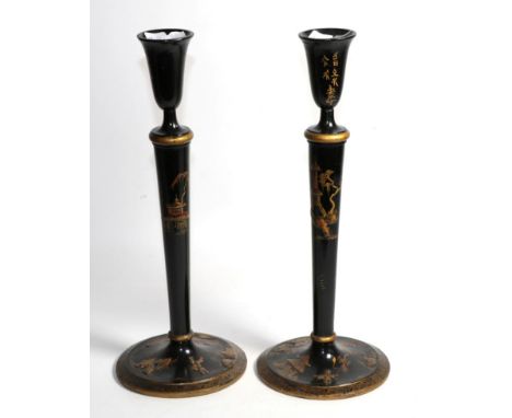 A pair of wooden Oriental candlesticks Stick one - restored at the base. Both sticks with light crazing and some flea bit chi