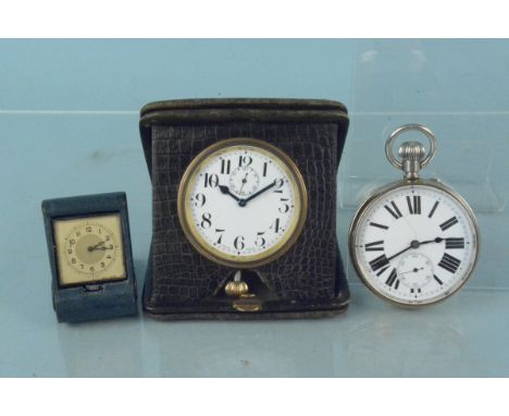 A metal cased enamel dial Goliath pocket watch together with two cased desk travel clocks