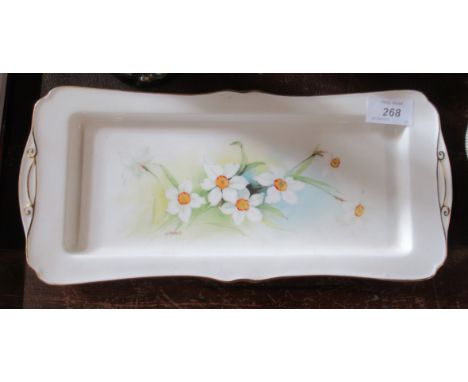 A Royal Worcester dish decorated with flowers by H. Everett, blue back stamp, width 13ins