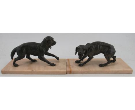 A pair of 19th century bronze models of dogs, raised on square marble bases, width 11.75ins, height 5.75ins