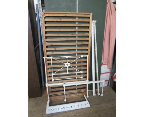 An Edwardian white painted bedstead, together with a fire surround and screen