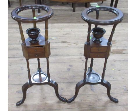A pair of 19th century mahogany wash/wig stands, fitted with a well for a bowl, over two small drawers to a shelf, height 30.