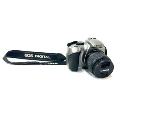 Silver Canon EOS 300D Digital SLR Camera with battery no charger with Canon zoom lens ef-s 18-55mm, both untested 