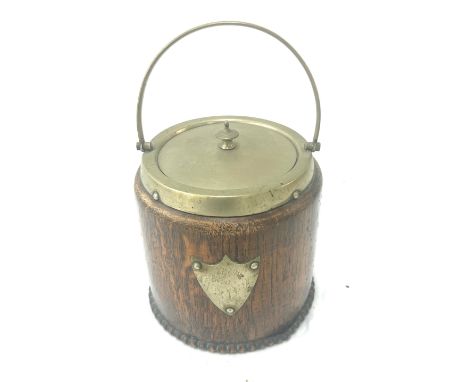 Vintage tea caddy with a blue and white porcelain insert measures approx 6.5 inches 