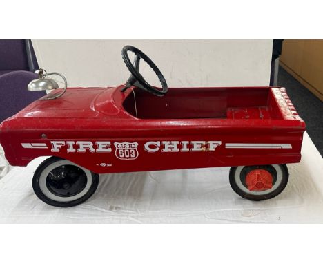 Vintage fire chief toy peddle car with bell ' Car no 53' measures approx 34 inches long by 11 inches tall 