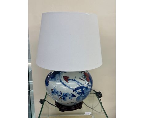 Oriental lamp with shade measures approx 22 inches tall 
