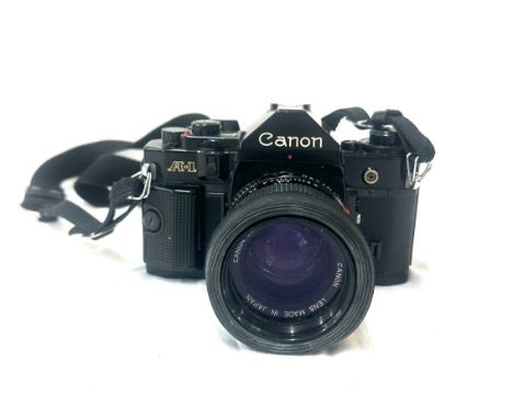 Canon A1 camera, Canon lens FD 50mm 1:14 lens both untested, 