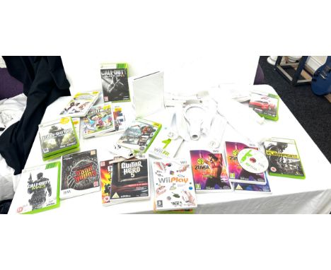Wii gaming console with a variety of games - no power leads/ one game black ops is not present the rest are, all untested 