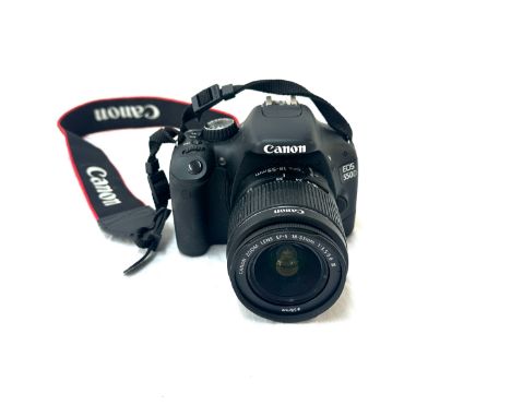 Canon EOS 550D camera with a Canon zoom lens EF-S 18-55mm, untested 