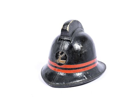 A 1950s/60s British leather Fire Helmet, the black helmet with two red strips, having applied circular stag emblem to the fro