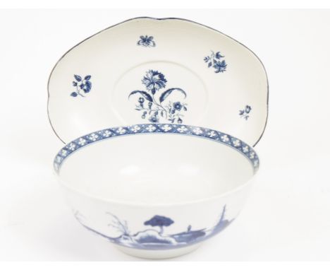 A 18th Century 1st period Worcester blue and white footed bowl, decorated in the oriental manner depicting trees, shrubs and 