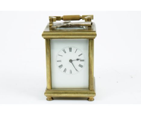 A late 19th Century brass repeater carriage clock by Richard et Cie, Paris, 8 day movement, enamel dial, Roman numerals, blue