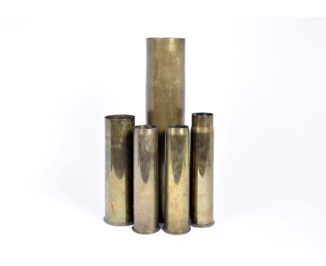 A group of WWI trench art shells, including a large German example dated 1916, two dated 1917, one 1918 and another, various 