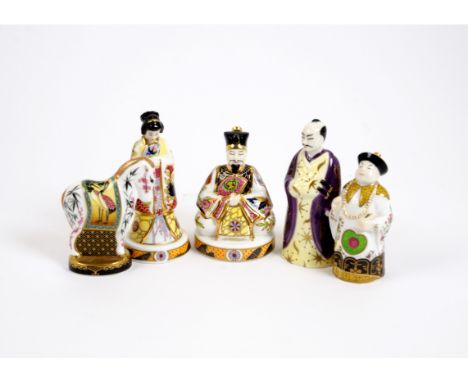 A collection of Royal Worcester porcelain candle snuffers, including four from 'The Connoisseur Collection, comprising limite