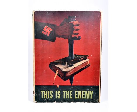 A WWII US Propaganda poster, 'This is the Enemy' designed by Barbara Marks, depicting a dagger through a Bible, by someone wi