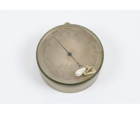 A Victorian Negretti &amp; Zambra pocket aneroid barometer, no.900, pressure scale 23-31, within a circular brass case, 6.5 c