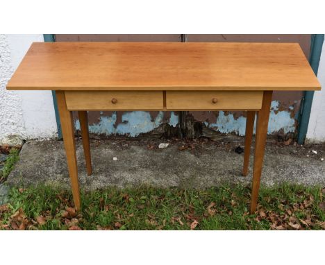 A modern pine console table, two frieze drawers, tapered supports, 122 cm wide x 40 cm deep x 77 cm high