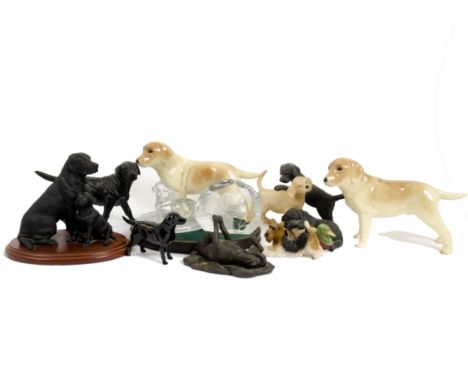 A large collection of ceramic dog figures and figure groups, including examples by Beswick, Royal Doulton and Border Fine Art