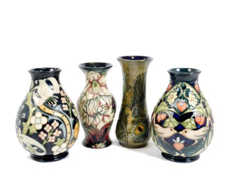 A group of four Moorcroft tubelined ceramic vases, comprising a baluster example decorated in 'The Strawberry Thief' pattern,