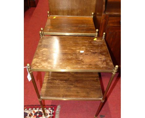 A near pair of mid-20th century turned gilt brass and simulated rosewood inset two-tier occasional tables, each raised on rol