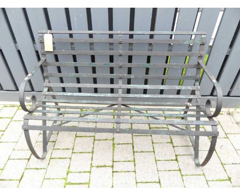A wrought iron strapwork two-seater garden bench, of scroll-end form, in the Regency taste, w.119cm