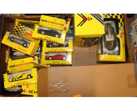 A tray of Maisto Corgi and other various scales boxed modern issue diecast, to include special edition Jaguar XJ320, McLaren 
