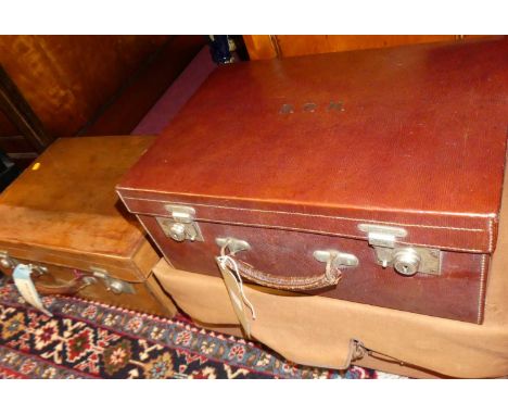 An early 20th century tan leather travelling vanity case by Drew &amp; Sons, Picadilly Circus, London, 51x35.5x19cm, together