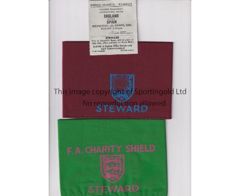 F.A. STEWARD ARM BANDS     Two arm bands, 1980 Charity Shield, Liverpool v West Ham United and 1981 England v Spain with stew