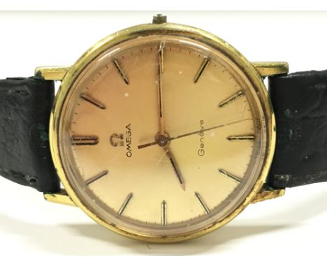 A Gentleman's Omega Geneve manual wind wristwatch in gold coloured case with stainless steel back, Cal No. 601, fitted on an 