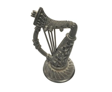 An Irish bog oak model of a harp (some faults).