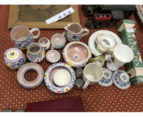 A collection of various Poole Pottery traditional white bodied items to include a tankard decorated in the CS pattern togethe