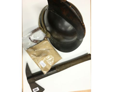 An early leather fireman's helmet by Hendry Limited, Glasgow together with a fireman's axe and related buttons.