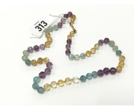 A 9 carat gold aquamarine, amethyst and citrine necklace.