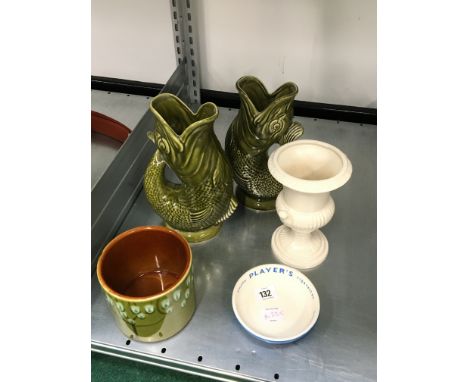 A pair of green glazed Dartmouth Pottery gurgle jugs together with a Poole Pottery plant pot and two other items.