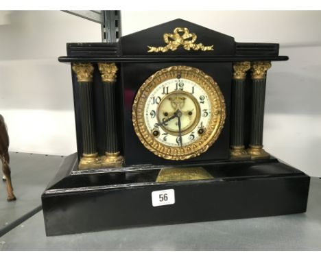 A late 19th century slate cased architectural mantle clock.