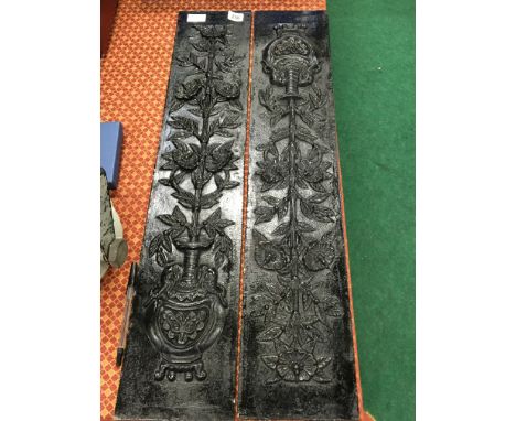 A pair of cast iron aesthetic movement fireplace tile insets