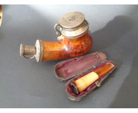 A briar wood alpine pipe and a Cheroot Holder