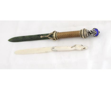 Two Russian Letter Openers.  The first  Silver and Enamel with Jade blade and mounted in semi precious stones.  The other bei