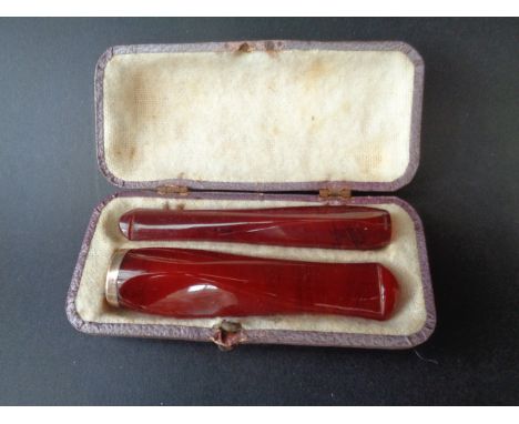 His and hers Chinese, amber pipe set