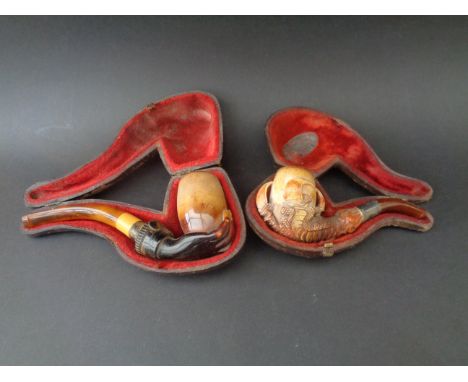 Meerschaum and amber hand pipe & meerschaum and amber claw pipe
