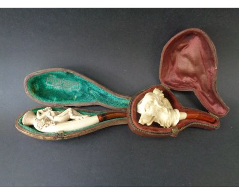 Meerschaum and amber reclining woman pipe & meerschaum and amber wolf pipe