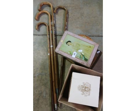 Collection of four walking sticks with various crest badges, sealed bottle of Bells Scotch Whisky, Wade decanter, commemorati