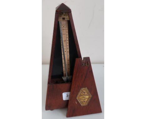 Malzel French mahogany cased Metronome with brass makers plaque on three turned feet with key 