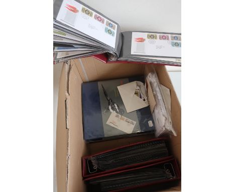 Collection of First Day Covers in five albums and various loose stamps 