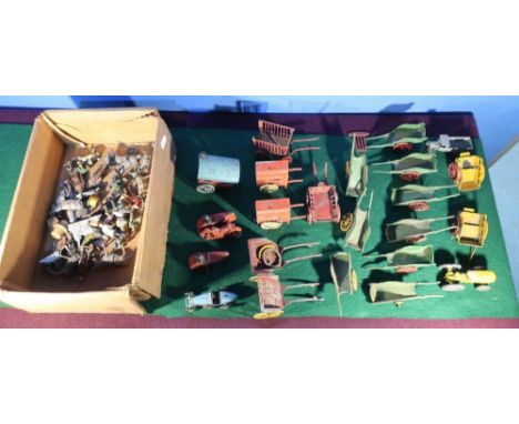 Collection of die-cast lead models, including Salko barrel organs , nine Charbens hand carts, two milk carts, six other unkno