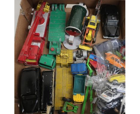 Collection of various scale die-cast models, including Corgi Major, Snorkel fire engine, Dinky coach, yellow tractor, Matchbo