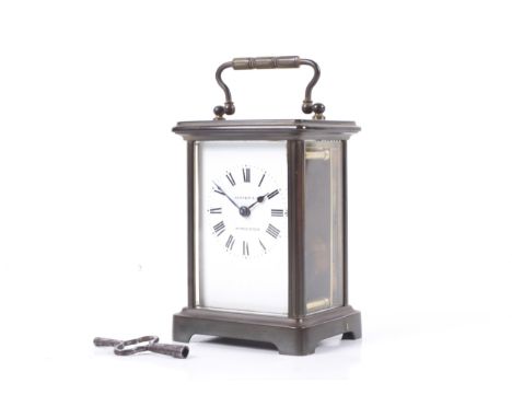 A French brass five glass carriage clock. Retailed by Cooper & Co, Worcester. Eight day movement with visible platform escape