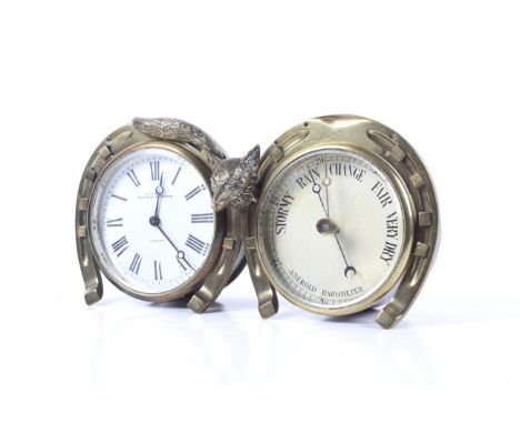 A hunting theme brass desk clock and barometer. Modelled as a fox and horseshoe, the clock marked 'Mappin & Webb, London', wi