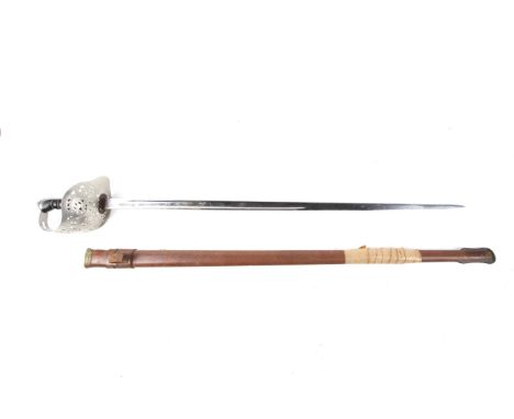 An 1897 pattern sword by Henry Wilkinson. The hilt pierced with the crown and 'GR', the blade marked '47085' below the hilt, 